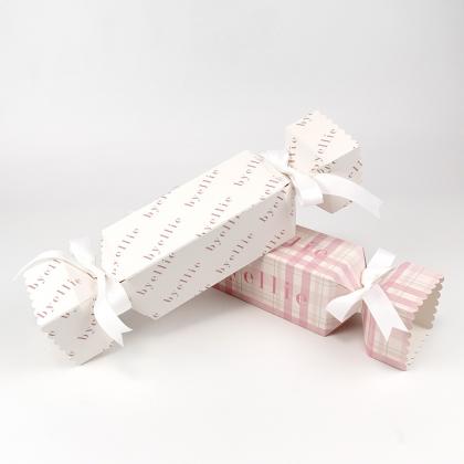 Christmas cracker boxes with ribbons